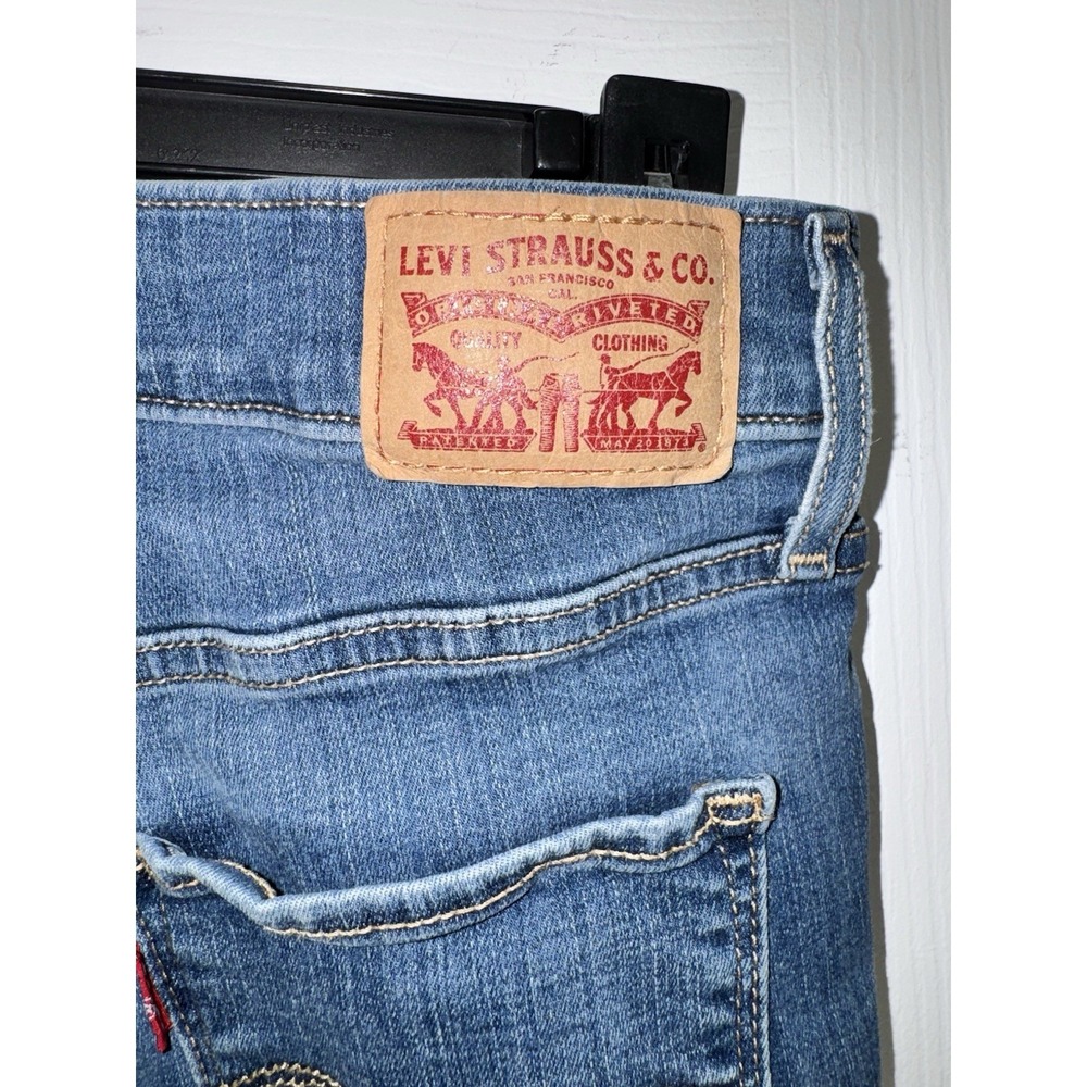 Levi's Women's 702 High Rise Super Skinny Distressed Blue Denim Jeans - Picture 4 of 7
